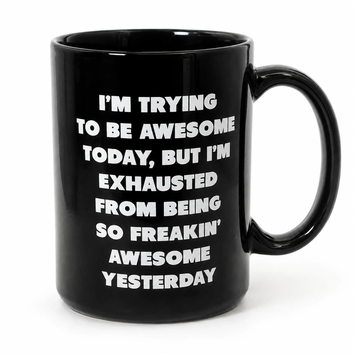 Front view of the glossy black mug with the original eight-line white awesome slogan