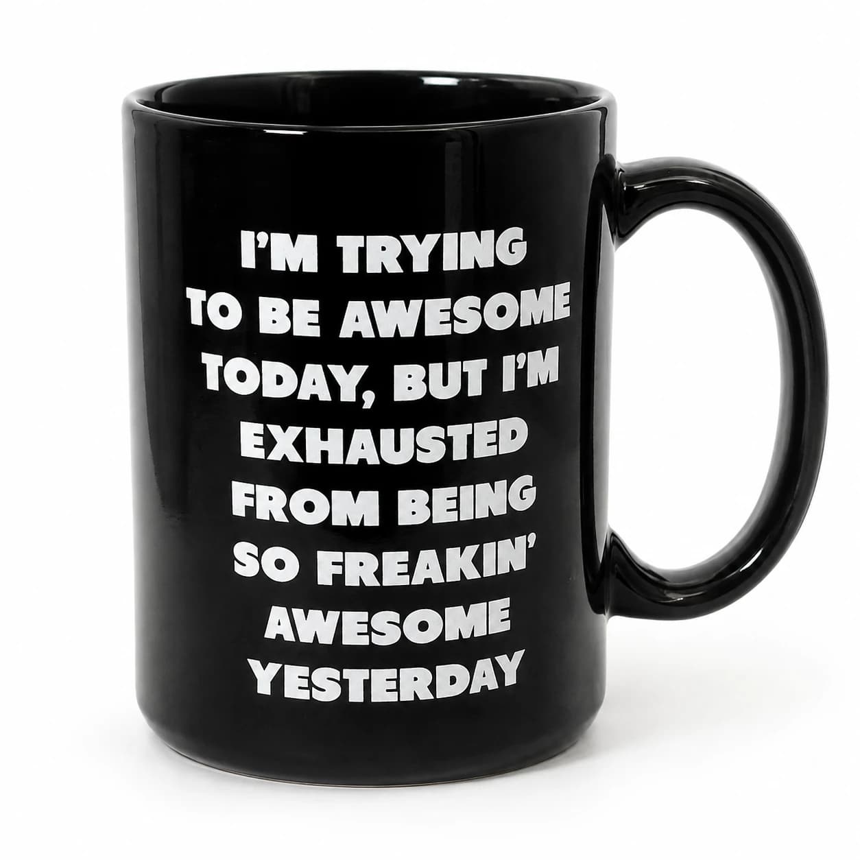 Front view of the glossy black mug with the original eight-line white awesome slogan