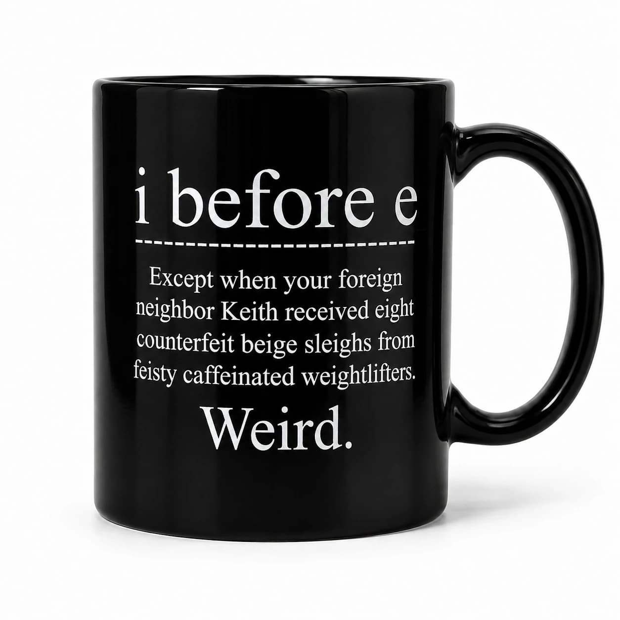 Front studio view of the I Before E — Weird Mug, with its original white slogan on glossy black ceramic