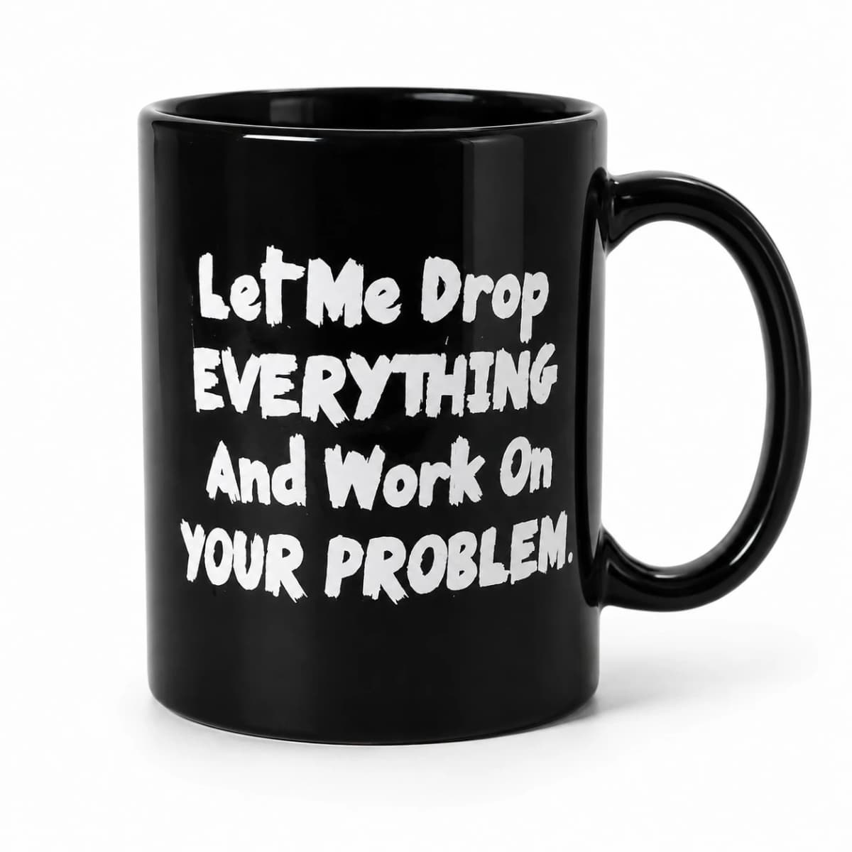 Front studio view of the Let Me Drop Everything Mug, with its original white slogan on glossy black ceramic