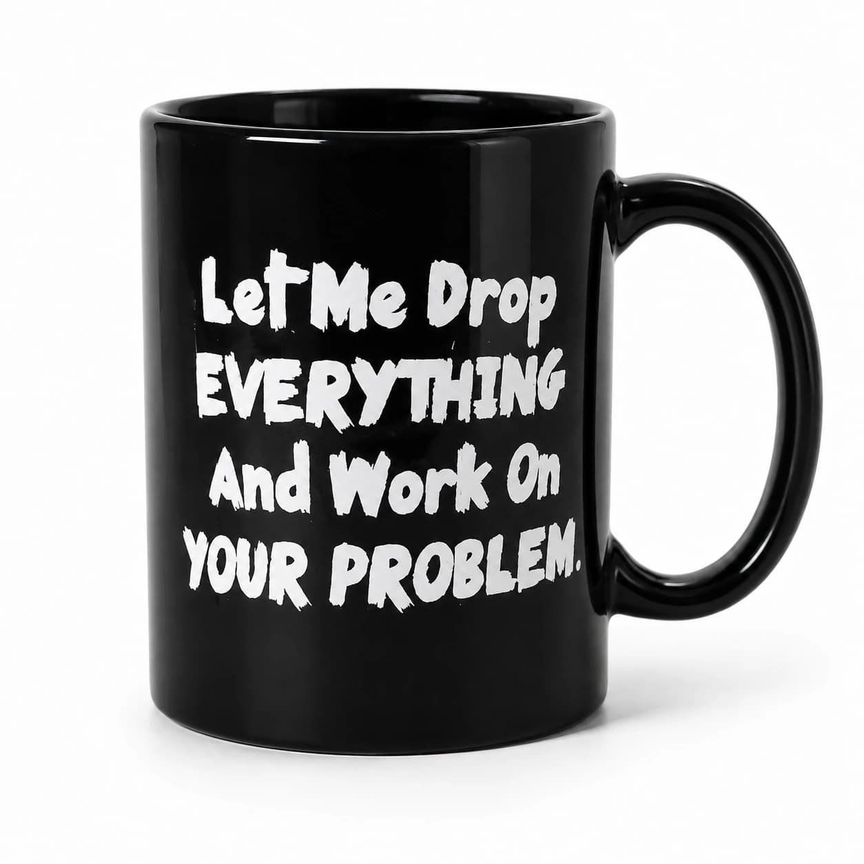 Front studio view of the Let Me Drop Everything Mug, with its original white slogan on glossy black ceramic