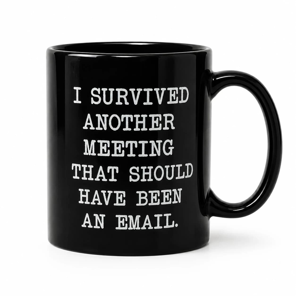 Front studio view of the black ceramic I Survived Another Meeting mug with its full white slogan